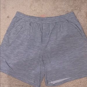 Lululemon light heather grey 7” linerless shorts